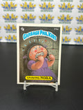 Vintage TOPPS 1986 Garbage Pail Kids Gnawing Nora Sticker Trading Card