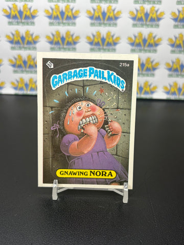 Vintage TOPPS 1986 Garbage Pail Kids Gnawing Nora Sticker Trading Card