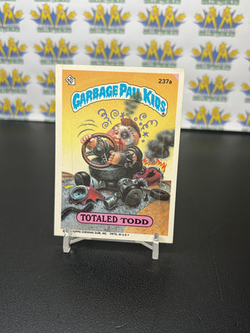 Vintage TOPPS 1986 Garbage Pail Kids Totaled Todd Sticker Trading Card