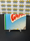 Vintage TOPPS 1986 Garbage Pail Kids Max Axe Sticker Trading Card